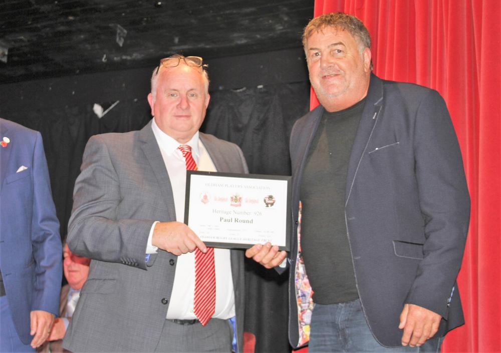 Paul Round receives his Heritage Certificate from club chairman Bill Quinn